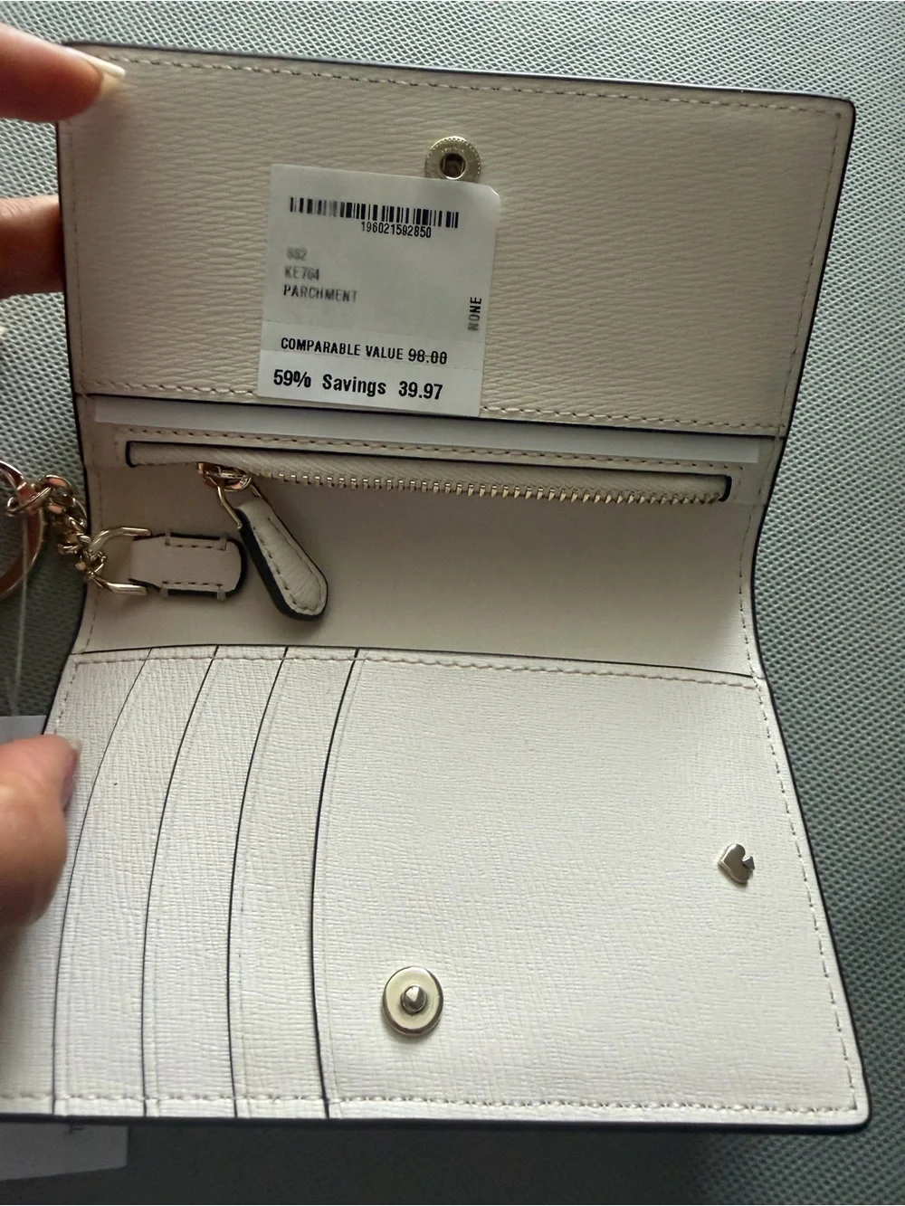 kate spade cream pebble leather card case with gold keyring